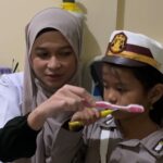 SiDokkes Polres Metro Bekasi Edukasi Siswa TK Amarika Lewat Program Polisi Sahabat Anak